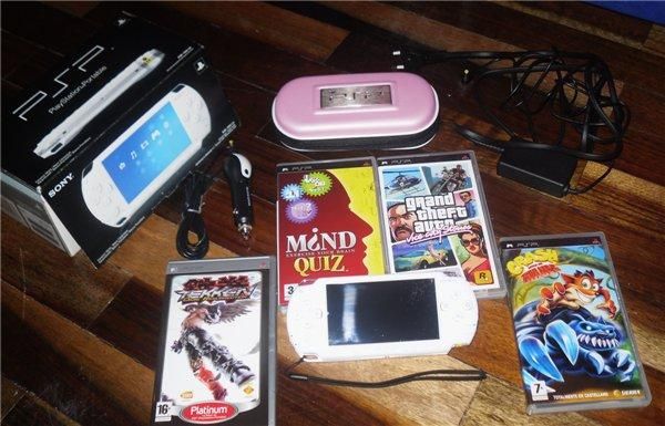 vendo psp blanca con accesorios y 4 juegos