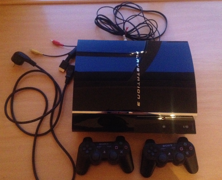 Ps3 60 gb + 2 mandos + 4 juegos