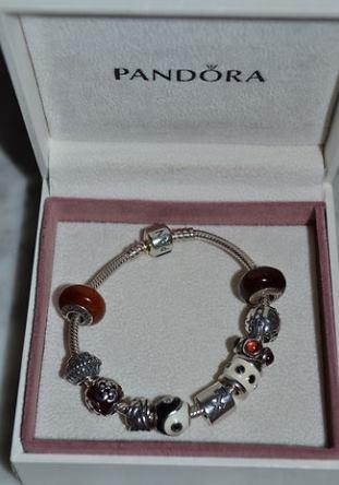 Vendo autentica pulsera pandora con diez abalorios
