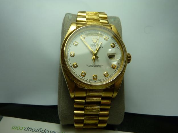 Rolex Day-Date con correa President Oro 24K, 12 diamantes.