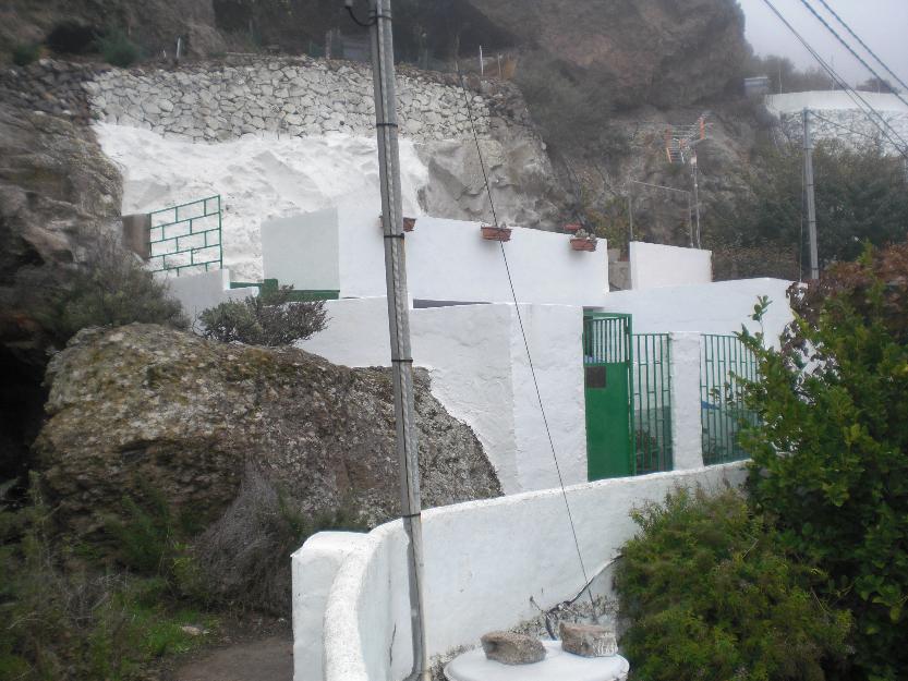 casa cueva con terreno