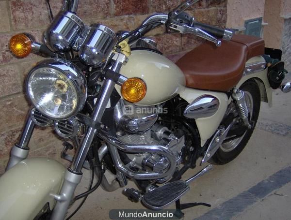 vendo moto 125 por no usarla