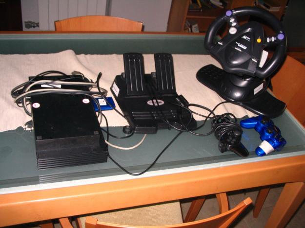 vendo play station 2con juegos y demas.