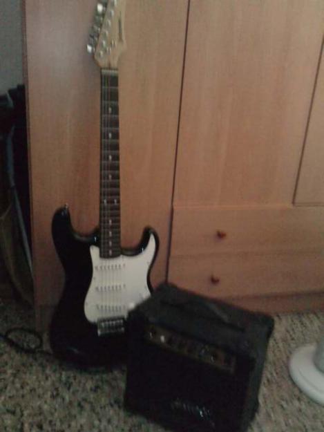 Vendo guitarra jonhson + amplificador yiwei