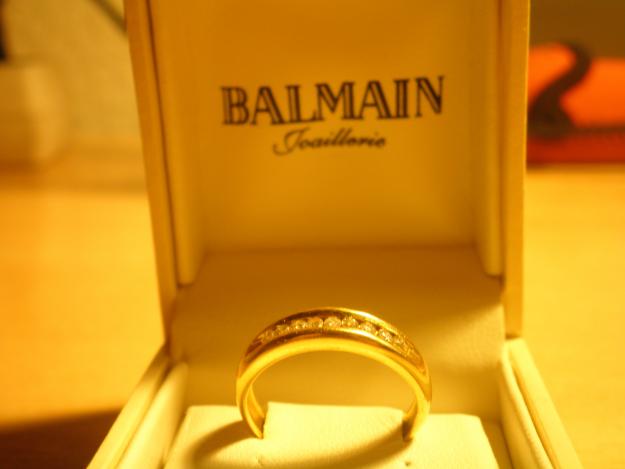 Anillo de oro de 18K y 9 Diamantes en talla brillante