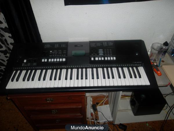 vendo teclado YAMAHA  psr E423 ,o cambio por mesa de mezclas