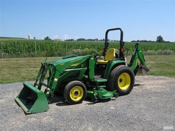 LAWN TRACTOR JOHN DEERE 4310 CON CARGADOR Y LAS PALAS