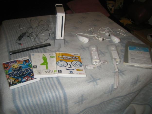 se wii nintendo con 2 mandos,tabla y 3 juegos
