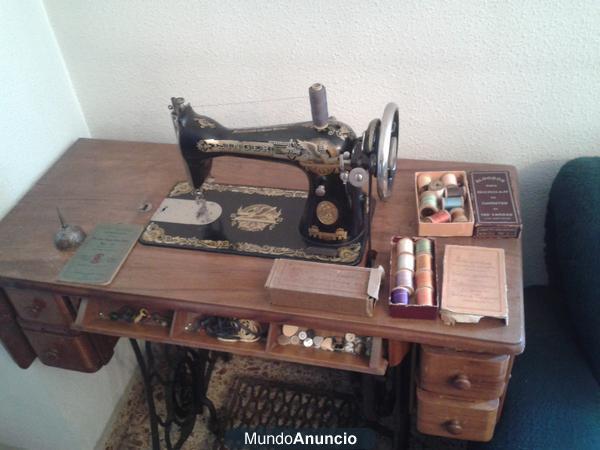 Vendo máquina de coser Singer.