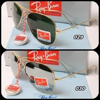 Gafas de sol RayBan y Carrera