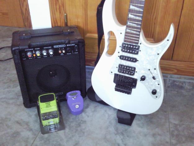 vendo guitarra electrica sunsmile,con amplificador