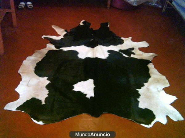 VENDO PIELES DE VACA Y CABRA NUEVAS, CURTIDAS PARA ALFOMBRAS PRECIOSAS