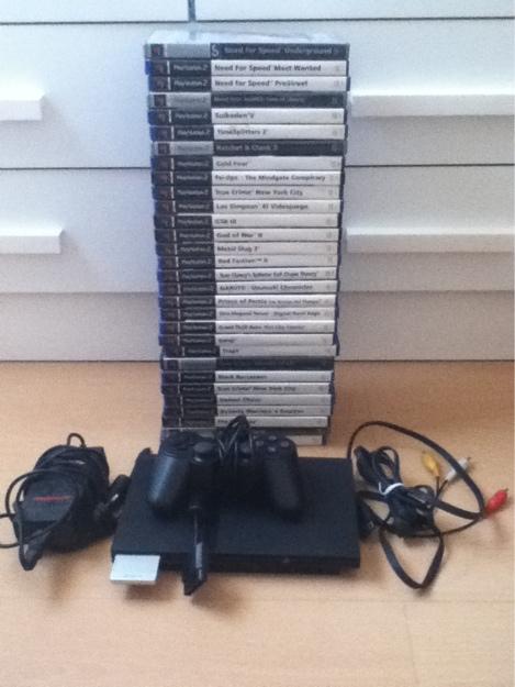 Ps2 con un mando y 28 juegos