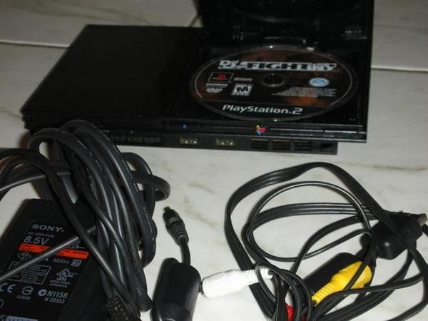 Ps2 liberada con juegos y accesorios